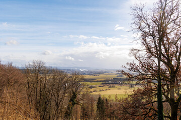 Fototapeta na wymiar View over the Allgäu near Leutkirch on a sunny day with blue sky