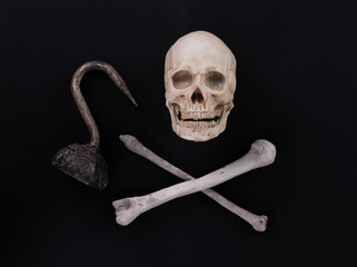 pirate skull and bones isolated on black background