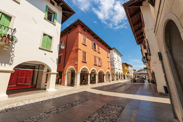 Main street in Spilimbergo downtown, called Corso Roma (Rome Street). Town of medieval origins, Pordenone province, Friuli-Venezia Giulia, Italy, southern Europe.