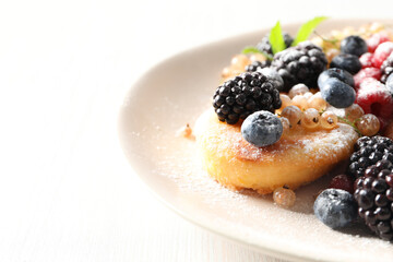 Concept of tasty sweet food, cheese pancakes, space for text