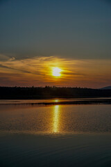sunbeam reflected in water