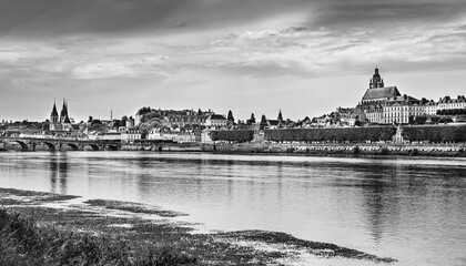 Blois, France: Landscape of Blois old town on the shores of Loire river in black and white