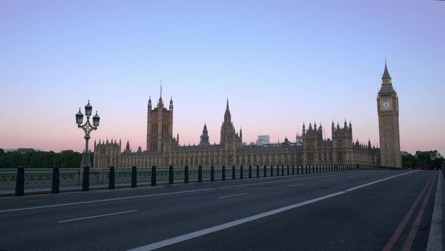 Low, wide angle shot of Westminster Bridge and Parliament at dawn with 28 Days Later feel