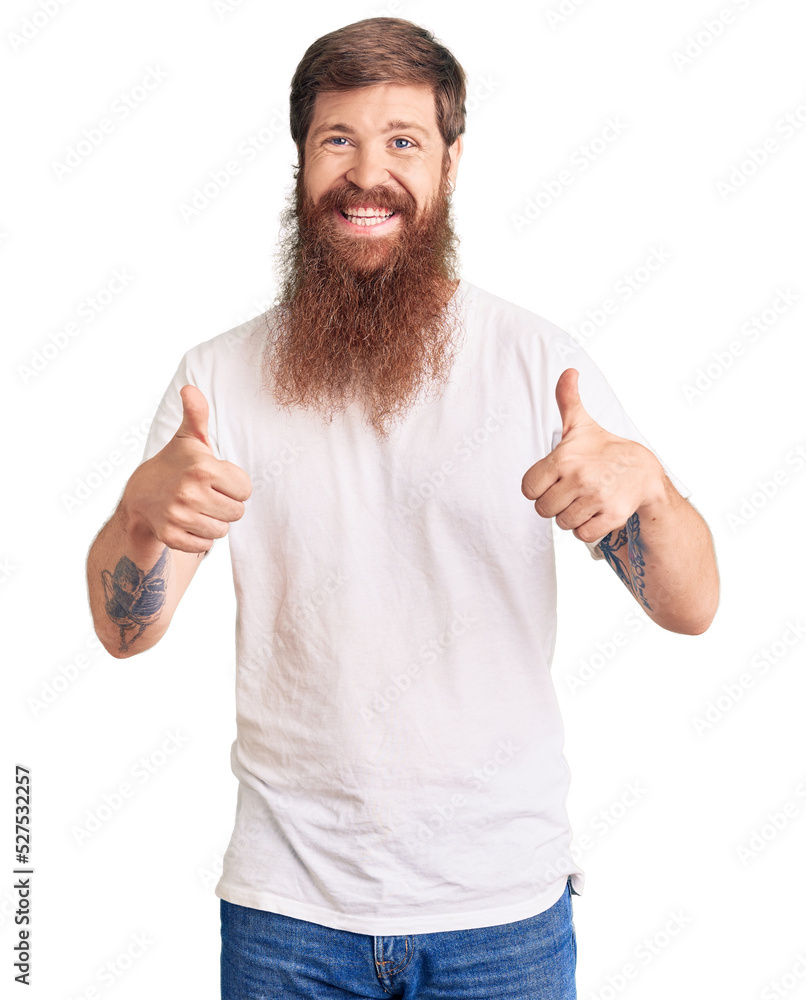 Sticker handsome young red head man with long beard wearing casual white tshirt success sign doing positive 