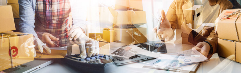 Startup small business entrepreneur or freelance Asian woman using a laptop with box, Young success Asian woman with her hand lift up, online marketing packaging box and delivery, SME concept.