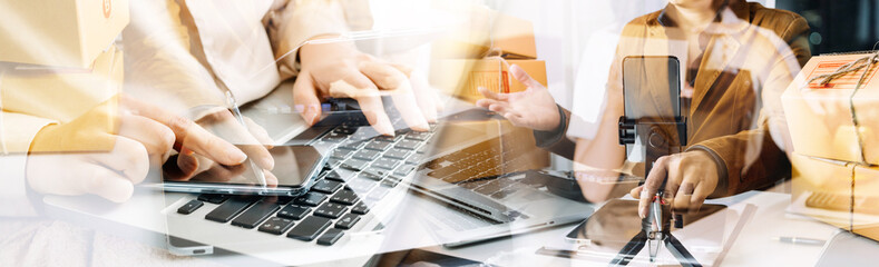 Startup small business entrepreneur or freelance Asian woman using a laptop with box, Young success Asian woman with her hand lift up, online marketing packaging box and delivery, SME concept.