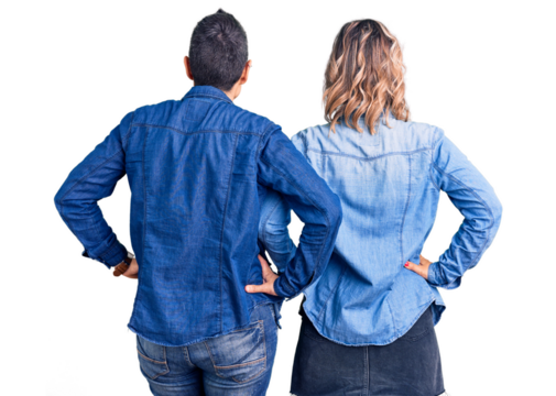 Couple of women wearing casual clothes standing backwards looking away with arms on body
