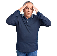 Senior handsome man wearing casual polo with hand on head for pain in head because stress. suffering migraine.