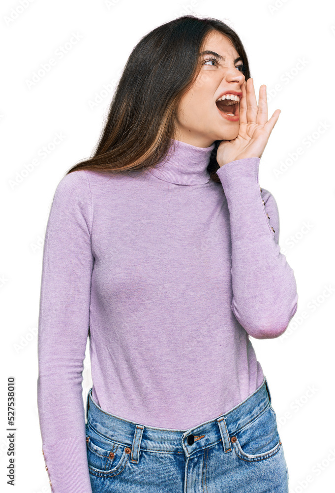 Poster Young beautiful teen girl wearing turtleneck sweater shouting and screaming loud to side with hand on mouth. communication concept.