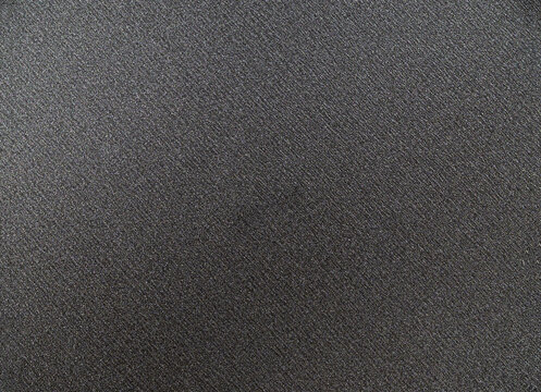 Black teflon non-stick pan surface as texture or background