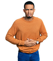 Young african american man wearing casual clothes with hand on stomach because indigestion, painful illness feeling unwell. ache concept.