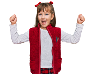 Little caucasian girl kid wearing casual clothes screaming proud, celebrating victory and success very excited with raised arms