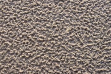 White sand with a pattern formed by rain drops