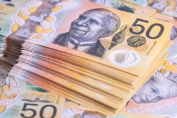 close up of Australian banknotes in piles