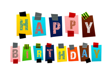 Happy Birthday concept. Colored pieces of paper on a white background