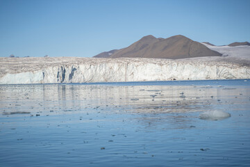 landscape view of an ice glacier in Svalbard islands, in the arctic sea