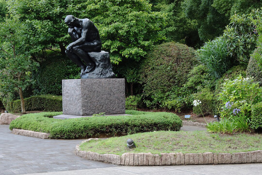 TOKYO, JAPAN - June 28, 2019: Rodin's 'The Thinker' sculpture in the garden of Tokyo's National Museum of Western Art in Ueno Park.