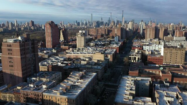 Crisp aerial shot of Harlem NYC rooftops with the Upper East and West Sides and Midtown in view