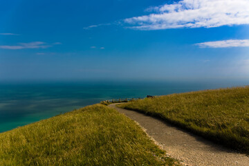 Fototapeta na wymiar Tranquil landscape/seascape image taken from Beachy Head park, next to the RAF memorial in Southern England.