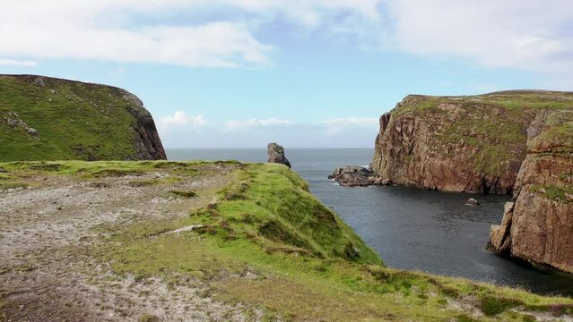 The cliffs and sea stacks at Port Challa on Tory Island, County Donegal, Ireland