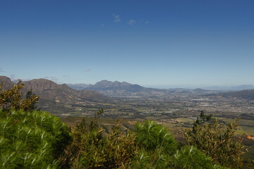 A view over Paarl towards Table Mountain and Cape Town in the distance. Simonsberg is visible in the middle of the photograph.