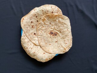 Desi Roti - Wheat Bread on black background