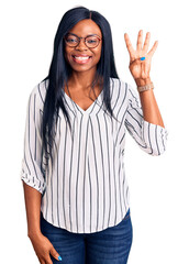 Young african american woman wearing casual clothes and glasses showing and pointing up with fingers number four while smiling confident and happy.