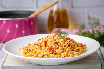 Bulgur pilaf with quinoa, food concept photo. Turkish name; kinoali bulgur pilavi