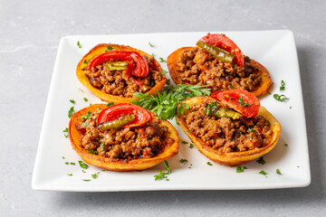 Traditional Turkish food; baked potato dish with minced meat, Turkish name; Patates karniyarik