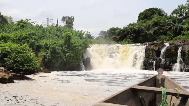 Kribi waterfalls in Cameroon and wild animals near the coast. African nature.