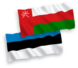 National vector fabric wave flags of Estonia and Sultanate of Oman isolated on white background. 1 to 2 proportion.