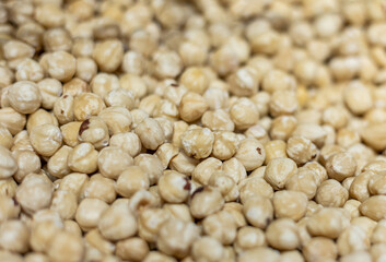 close up of roasted whole hazelnuts