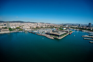 Naklejka na ściany i meble Panorama of Barcelona. City and port. Sunny day