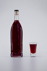 strong alcohol drink, colored tincture or whiskey, rum, vermouth, brandy, wine