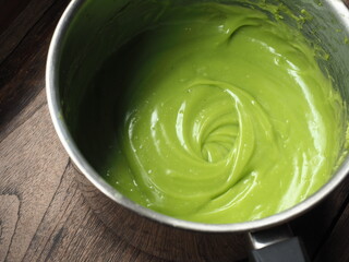 green pandan custard cream in saucepan