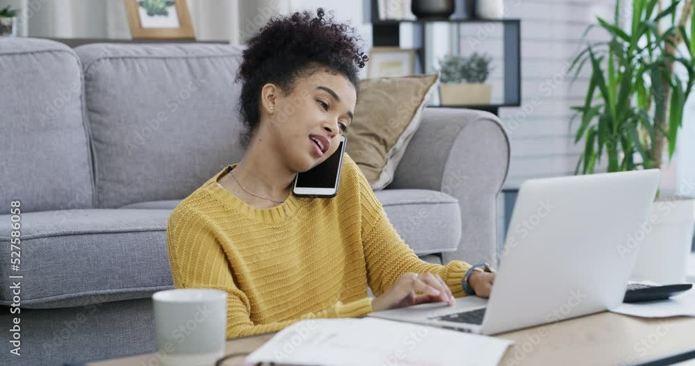 Poster woman on a phone call and working on a laptop while on the floor in her living room. girl with a fre