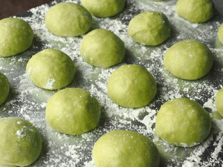 natural green colored pandan bread roll dough