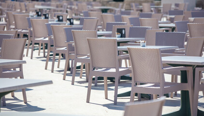 Plastic chairs and tables in a restaurant.