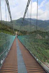 Fototapeta na wymiar suspension bridge in the moutain design for leisure oudoor activity