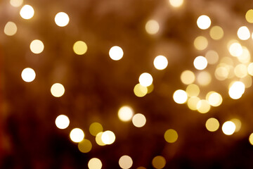 Golden Christmas or New year bokeh lights. Horizontal orientation.