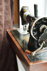 an old sewing machine. antiques, an old item. background for the design.
