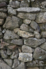 Stone wall in color background