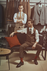 gentlemen in clothes shop
