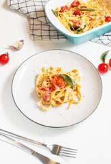 Fetapasta. Trending viral Feta bake pasta recipe made of cherry tomatoes, feta cheese, garlic and herbs