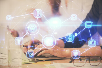 Double exposure of woman hands typing on computer and social network theme hologram drawing. People media concept.