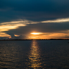 Summer cloudy sky on the river in Bangladesh