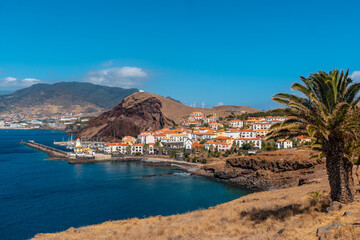 Fototapeta na wymiar Coastal village of Canical in Madeira. Fishing port, Machico near Ponta de Sao Lourenco