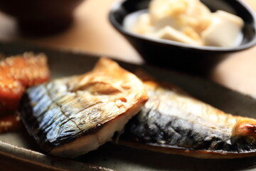 ish dishes and vegetables cooked as a common dinner in Japan