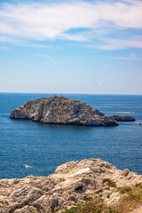 Fototapeta na wymiar Islet Tiboulen or islet of Tiboulen du Frioul, an islet 30 meters high, to the west of the Frioul archipelago, in the Mediterranean Sea off Marseille
