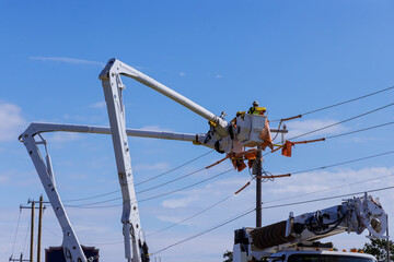 A technician in electrical power pole maintenance industry has been hired to repair the after storm...